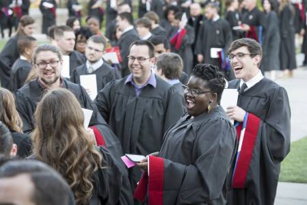 Students in gowns prepare to enter Duke Chapel