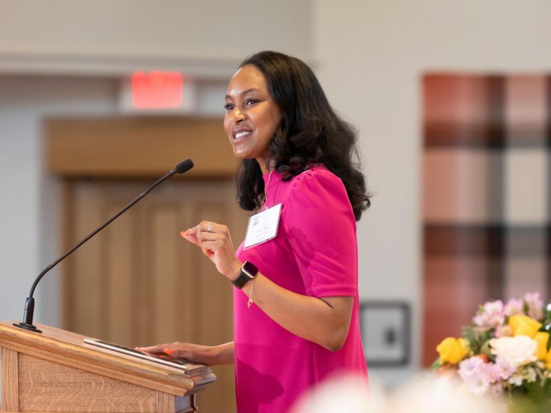 Amber Scott addresses the attendees during the evening celebration.