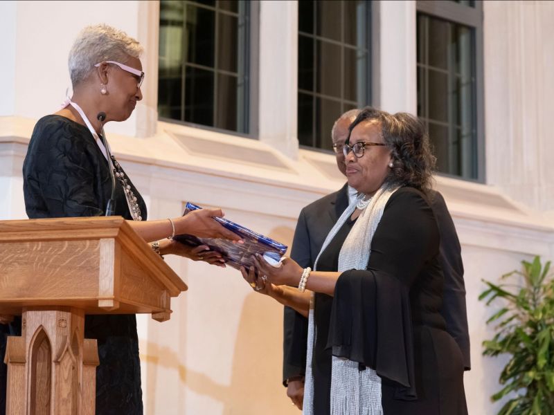 Josefa Bethea Wall, daughter of Bishop Joseph Bethea, receives gift for Bethea Fund