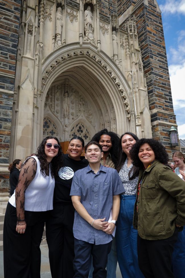 Students pose outside Duke Chapel at Closing Convocation 2025.