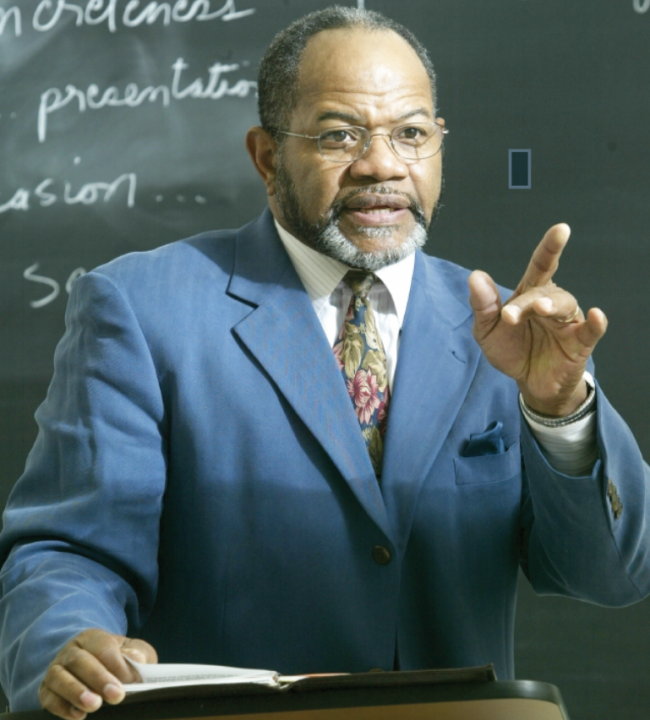 William C. Turner Jr. in blue suit and paisley tie