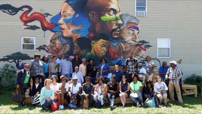 Participants in the 2015 Green The Church summit in Chicago visited a Sweet Water Foundation project, which includes a garden and renovated house.
