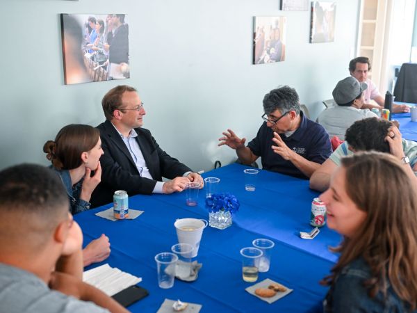 Duke Divinity School professor Peter Casarella speaks to seminar leaders and students over dinner at the Duke Catholic Center’s Falcone-Arena House.