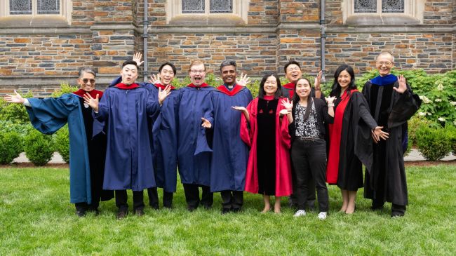 Graduates of Asian House pose near Duke Chapel