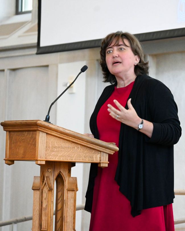 Jerusha Neal speaking in Goodson Chapel at Women's Center 50th Anniversary