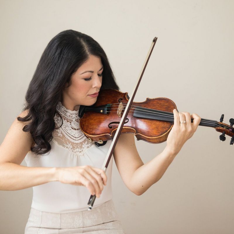 shot of woman playing violin