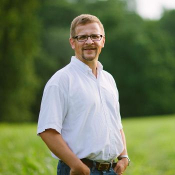 Norman Wirzba in a field