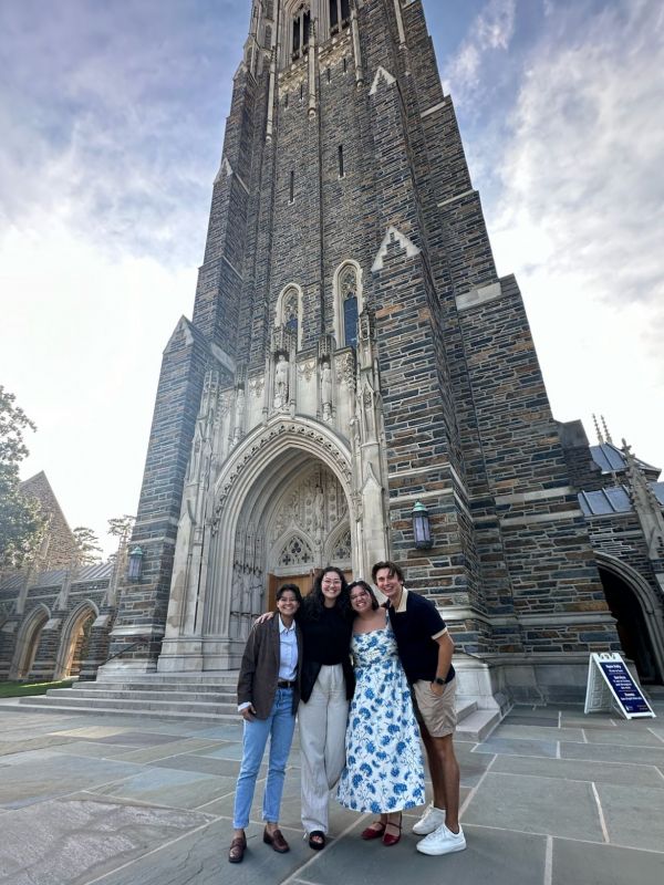 Jalen Garza (left) with classmates in front of Duke Chapel
